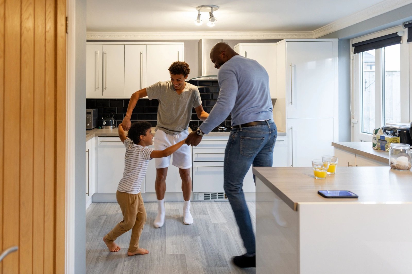 Family enjoying time together in a home kitchen