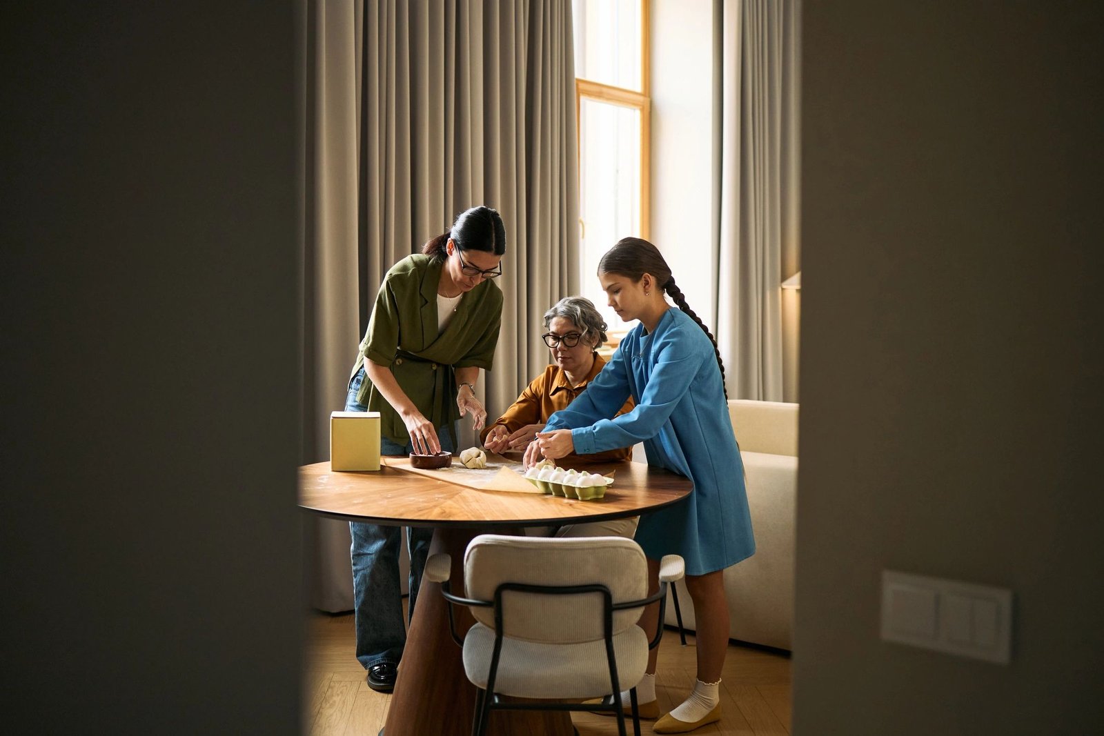 Family preparing food together at home